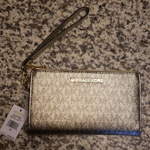 Michael Kors pale gold jet set traveler